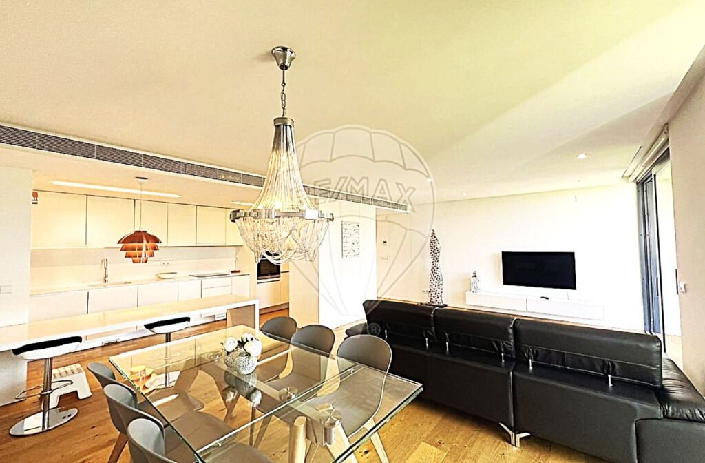 Expansive open-plan living area combining the dining room, lounge, and high-end kitchen.