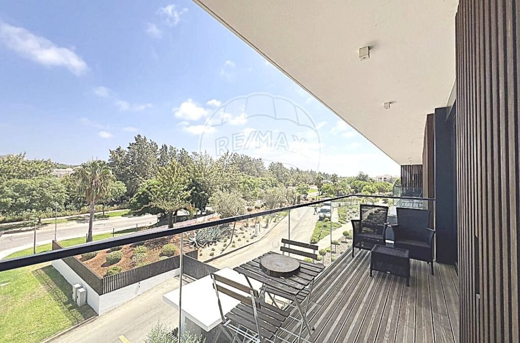 Private veranda offering a peaceful view over the landscaped communal gardens.