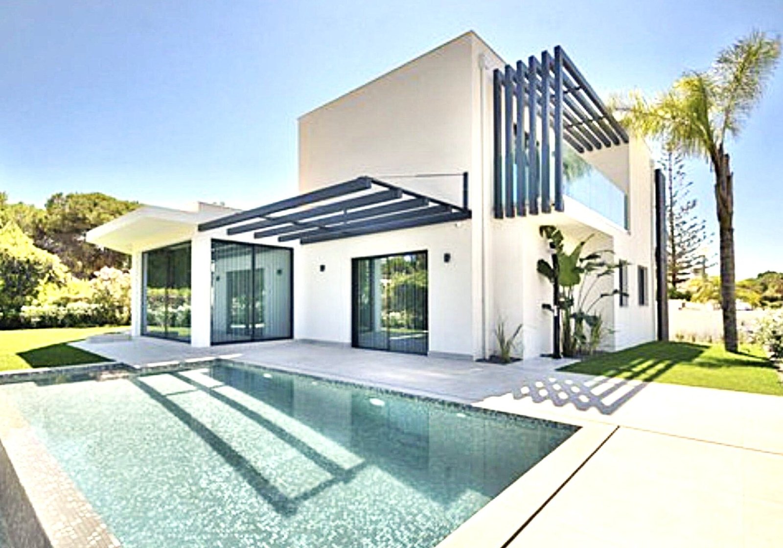 Luxury Quarteira real estate Portugal villa with pool and gardens