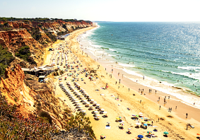 Vilamoura golden sandy beach with coastal views